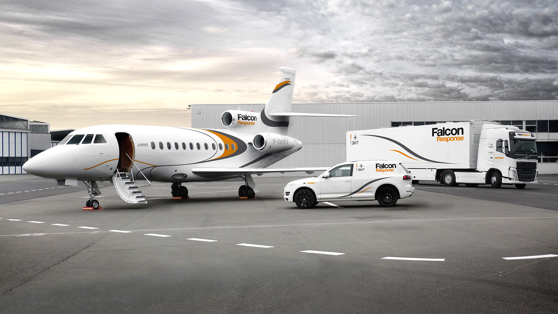 Image of Falcon Response vehicles and aircraft at an airport ready to repair an AOG Falcon.
